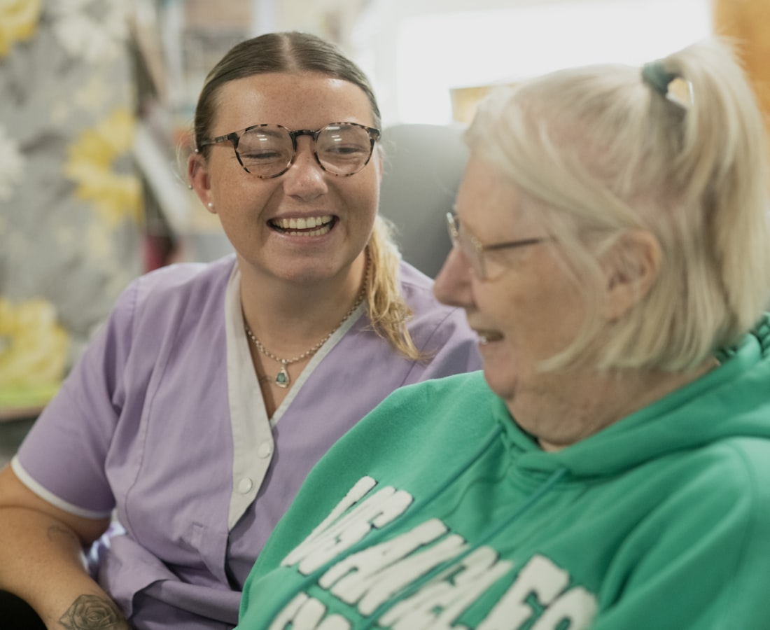 Dr. Aussem providing in-home hearing care